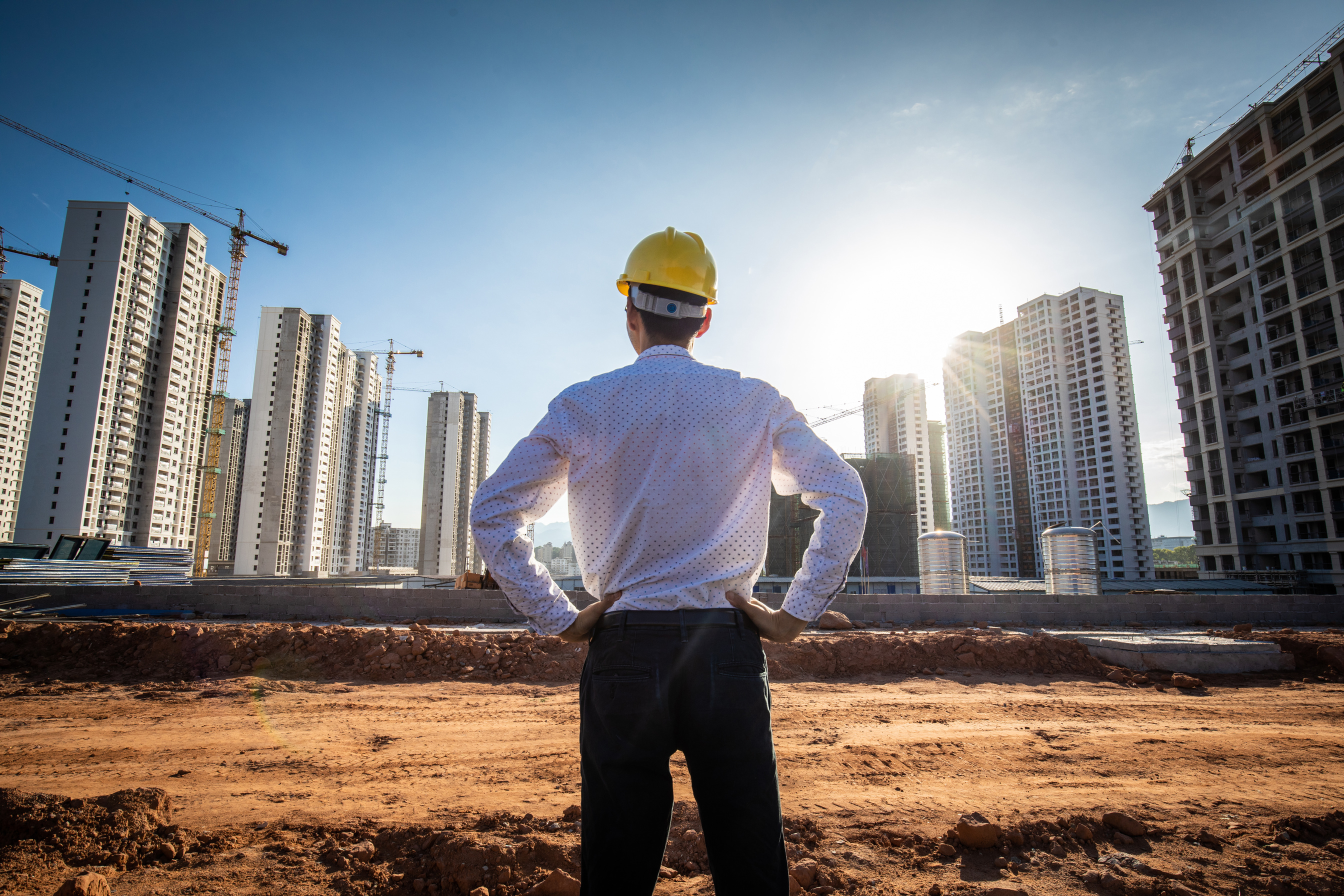 Engineer looking construction building